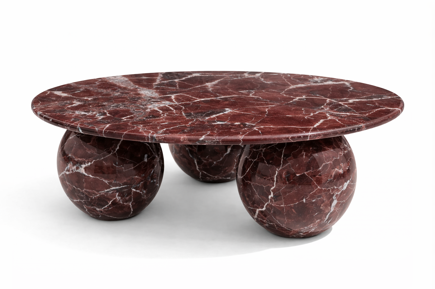 Marble coffee table with a red veined pattern on a white background red marble rosso levanto coffee table