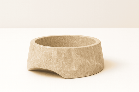Beige marble bowl on a white background