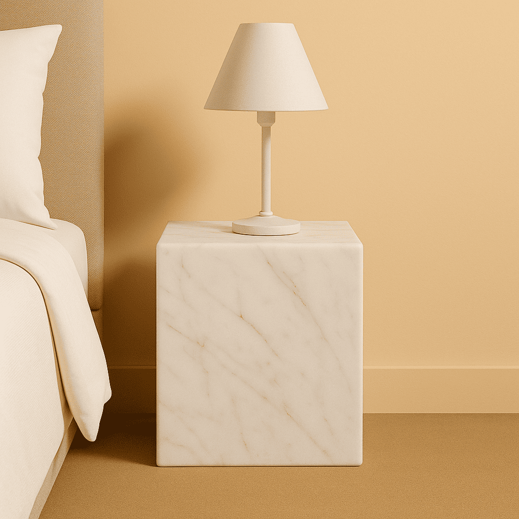 Marble nightstand with a lamp against a beige wall