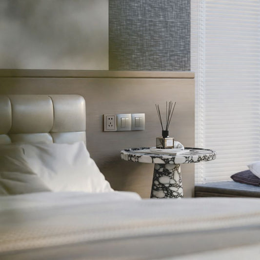 marble side table used as a bedside table