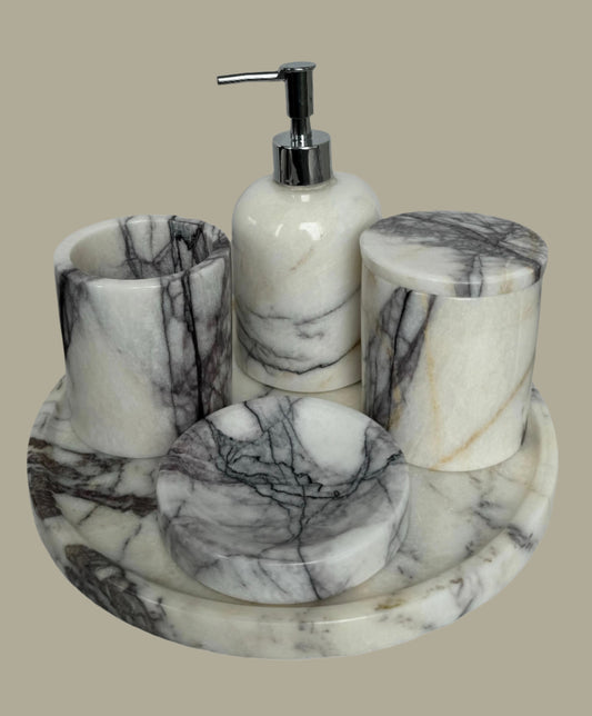 Sustainable 5-piece calacatta viola marble bathroom set with gold or silver pump. Includes dispenser, dish, tumblers, and tray. Handcrafted by Aurora Marble artisans.