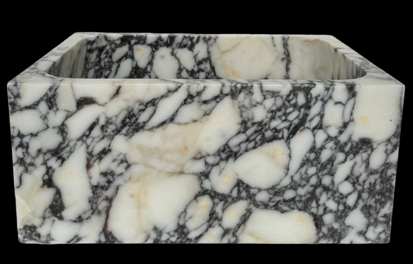 Luxury Calacatta Viola marble sink by Aurora Marble, featuring bold burgundy veining and minimalist sculptural design, handcrafted for high-end bathroom interiors.