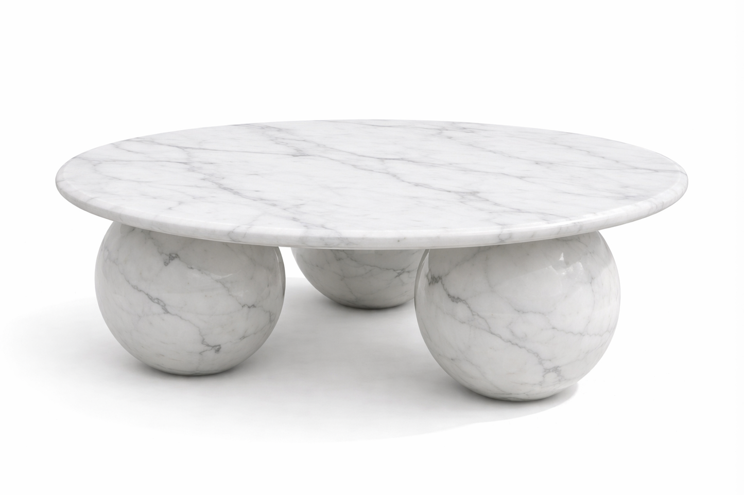Marble coffee table with spherical bases on a white background. white marble coffee table