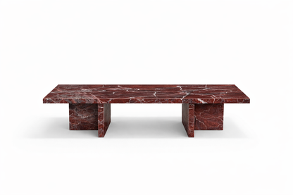 Marble coffee table with a red veined pattern on a white background. rosso levanto rectangular marble table

