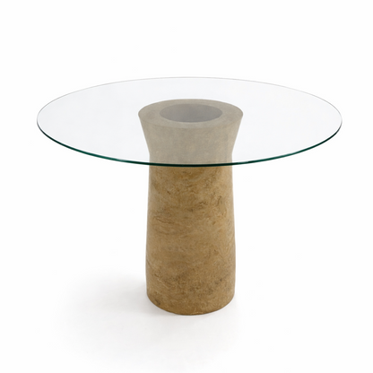 Glass table with a marble base on a white background