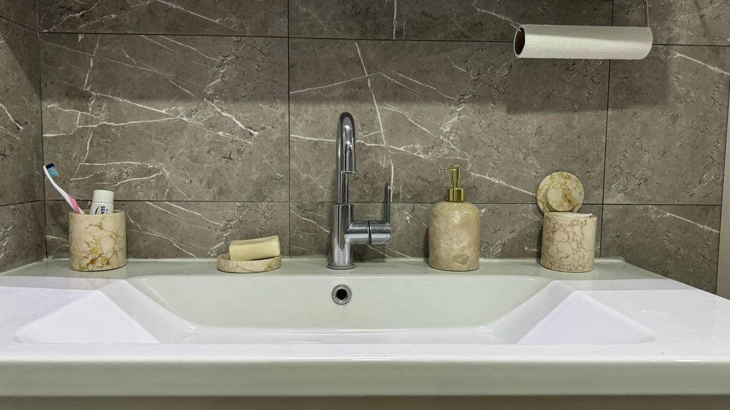 marble bathroom set, luxury bathroom accessories, handcrafted marble, bathroom décor, cream marble, Scandinavian design, stone soap dispenser, natural marble tray, high-end bathroom set, Aurora Marble