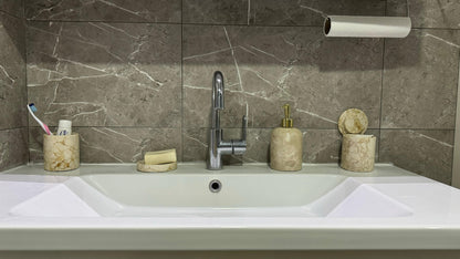 marble bathroom set, luxury bathroom accessories, handcrafted marble, bathroom décor, cream marble, Scandinavian design, stone soap dispenser, natural marble tray, high-end bathroom set, Aurora Marble