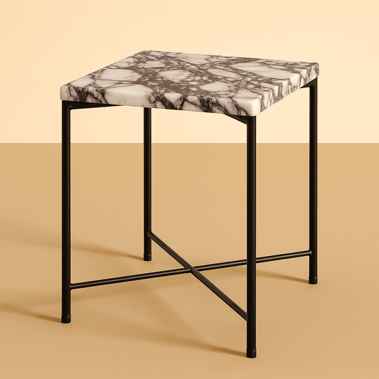 Small bar stool with marble-patterned top and black metal frame on a beige background