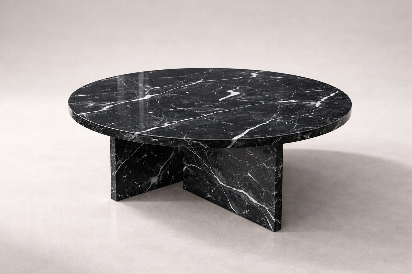 Black marble coffee table on a light gray background