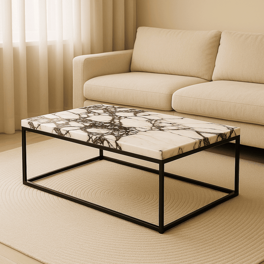 Coffee table with marble-like top and black metal frame in a living room setting.