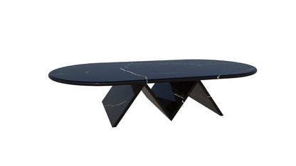 Modern black marble coffee table with unique geometric legs on a white background