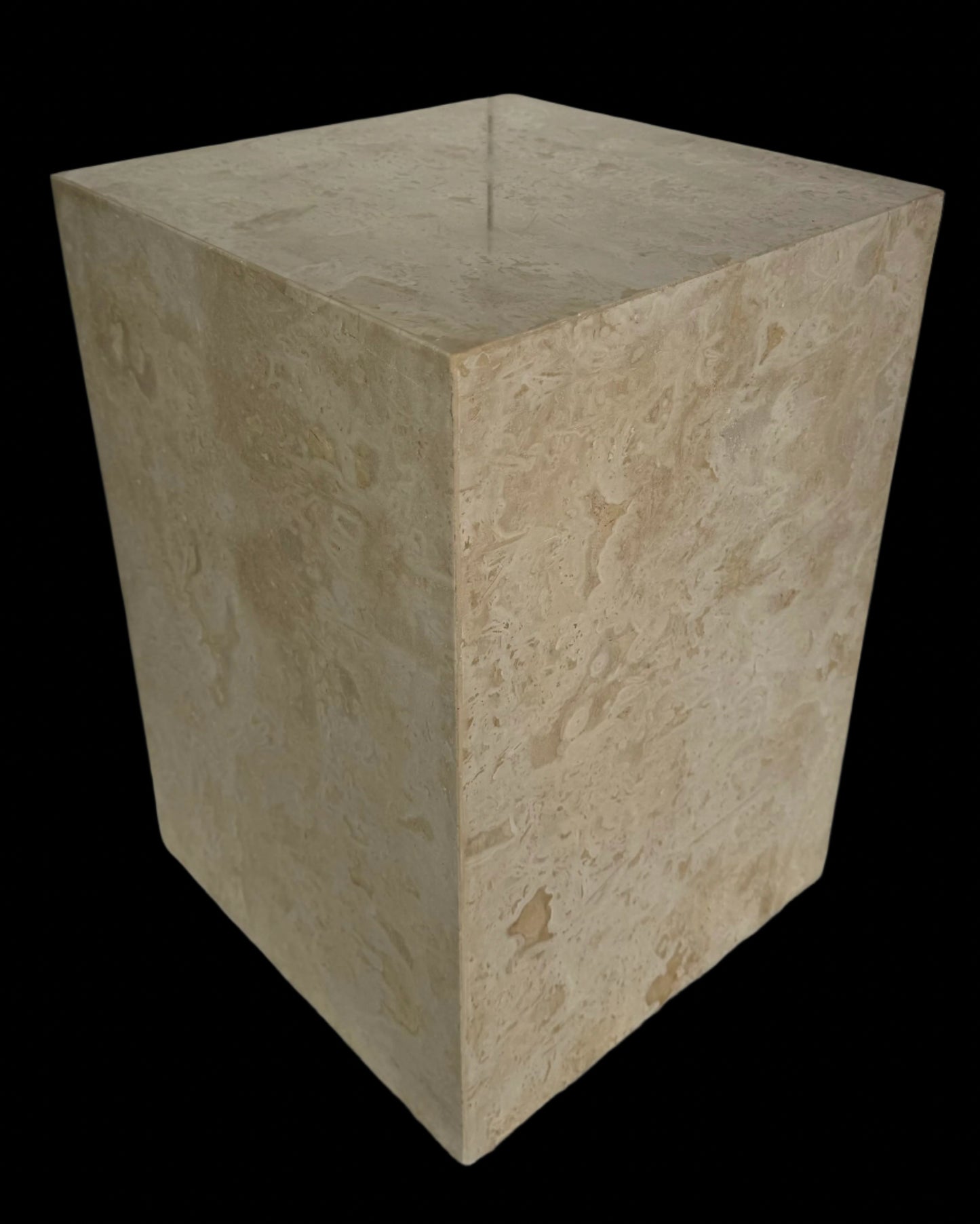 Minimalist cube side table made of natural beige travertine, handcrafted by Aurora Marble, with soft honed finish and fossil-rich texture.