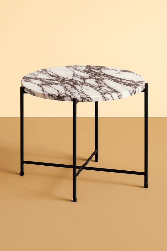 round side table with marble top and black metal frame on a beige background from aurora marble