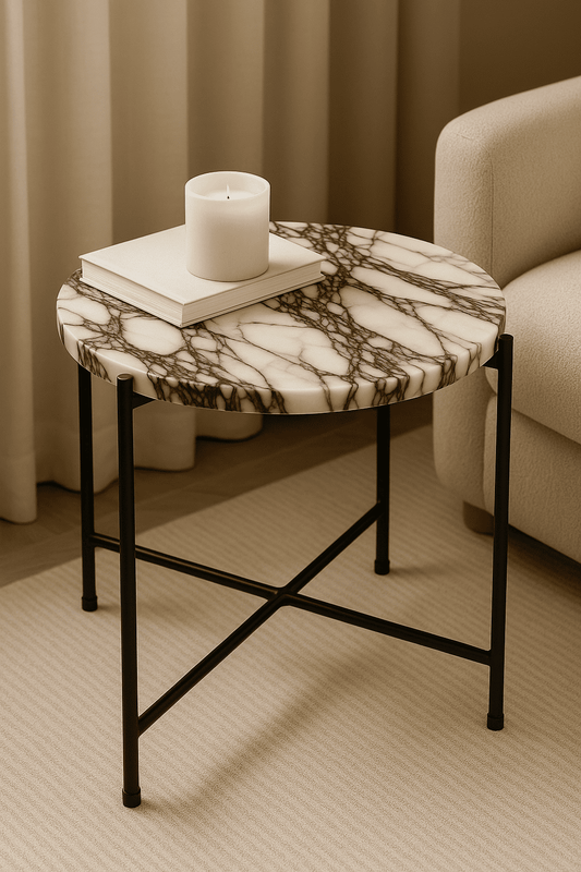 round side table with marble top and black metal frame on a beige background from aurora marble
