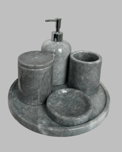 Sustainable 5-piece gray marble bathroom set with gold or silver pump. Includes dispenser, dish, tumblers, and tray. Handcrafted by Aurora Marble artisans.