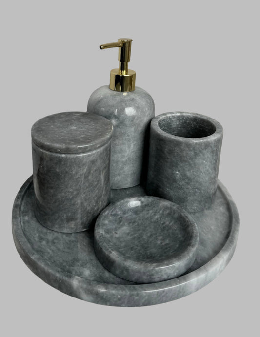 Sustainable 5-piece gray marble bathroom set with gold or silver pump. Includes dispenser, dish, tumblers, and tray. Handcrafted by Aurora Marble artisans.