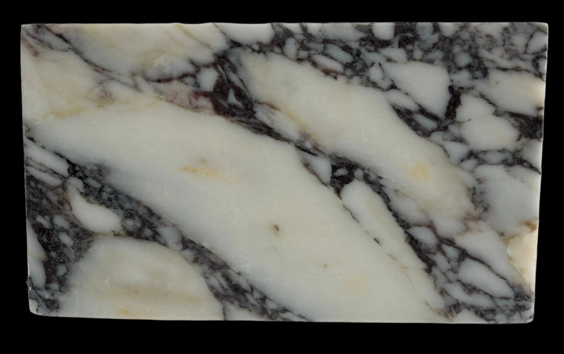 Luxury Calacatta Viola marble sink by Aurora Marble, featuring bold burgundy veining and minimalist sculptural design, handcrafted for high-end bathroom interiors.