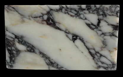 Luxury Calacatta Viola marble sink by Aurora Marble, featuring bold burgundy veining and minimalist sculptural design, handcrafted for high-end bathroom interiors.