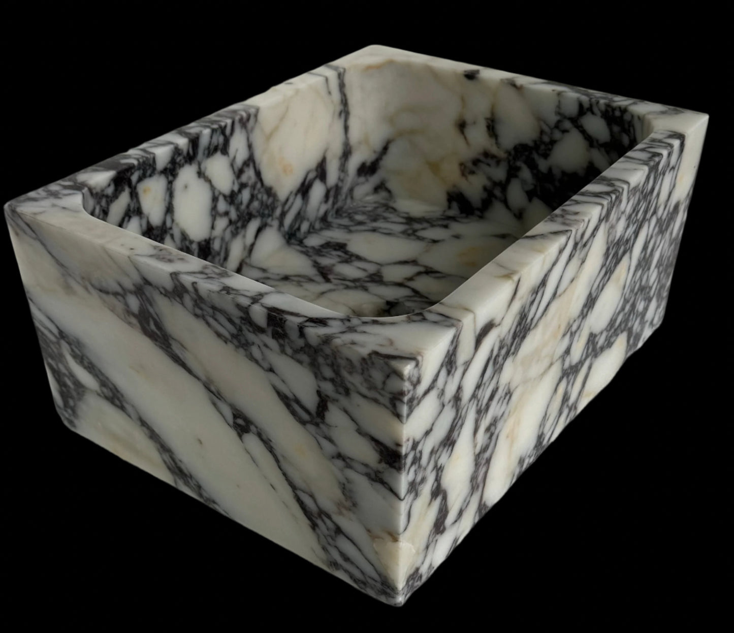 Luxury Calacatta Viola marble sink by Aurora Marble, featuring bold burgundy veining and minimalist sculptural design, handcrafted for high-end bathroom interiors.