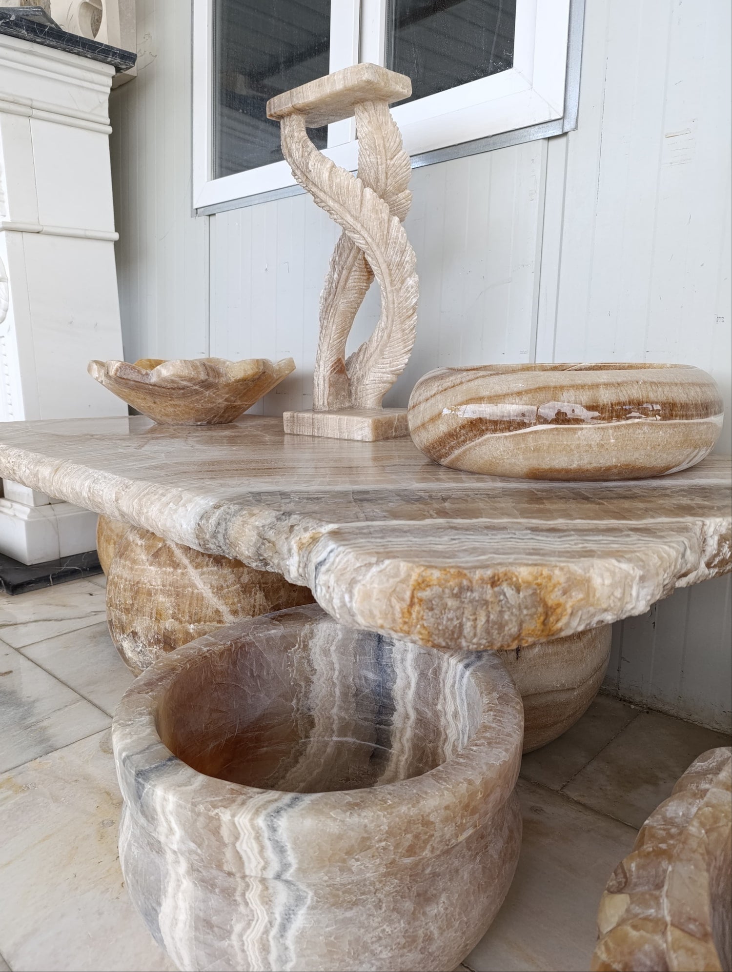 aurora marble hand made sculptures and tables from sweden with elegance